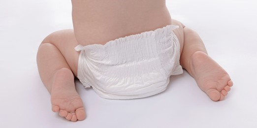 Photo of Cute little baby on white background, closeup