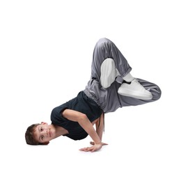 Photo of Boy in stylish clothes dancing on white background