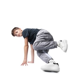 Photo of Boy in stylish clothes dancing on white background