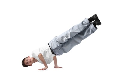Photo of Boy in stylish clothes dancing on white background
