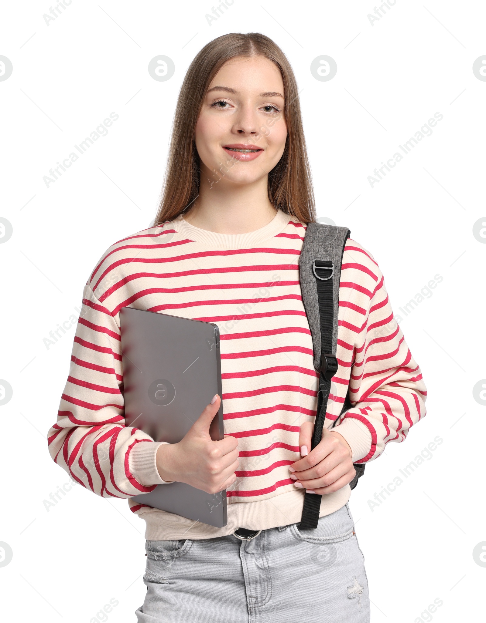 Teenage girl with laptop and backpack on white background Photo of Teenage girl with laptop and backpack on white background