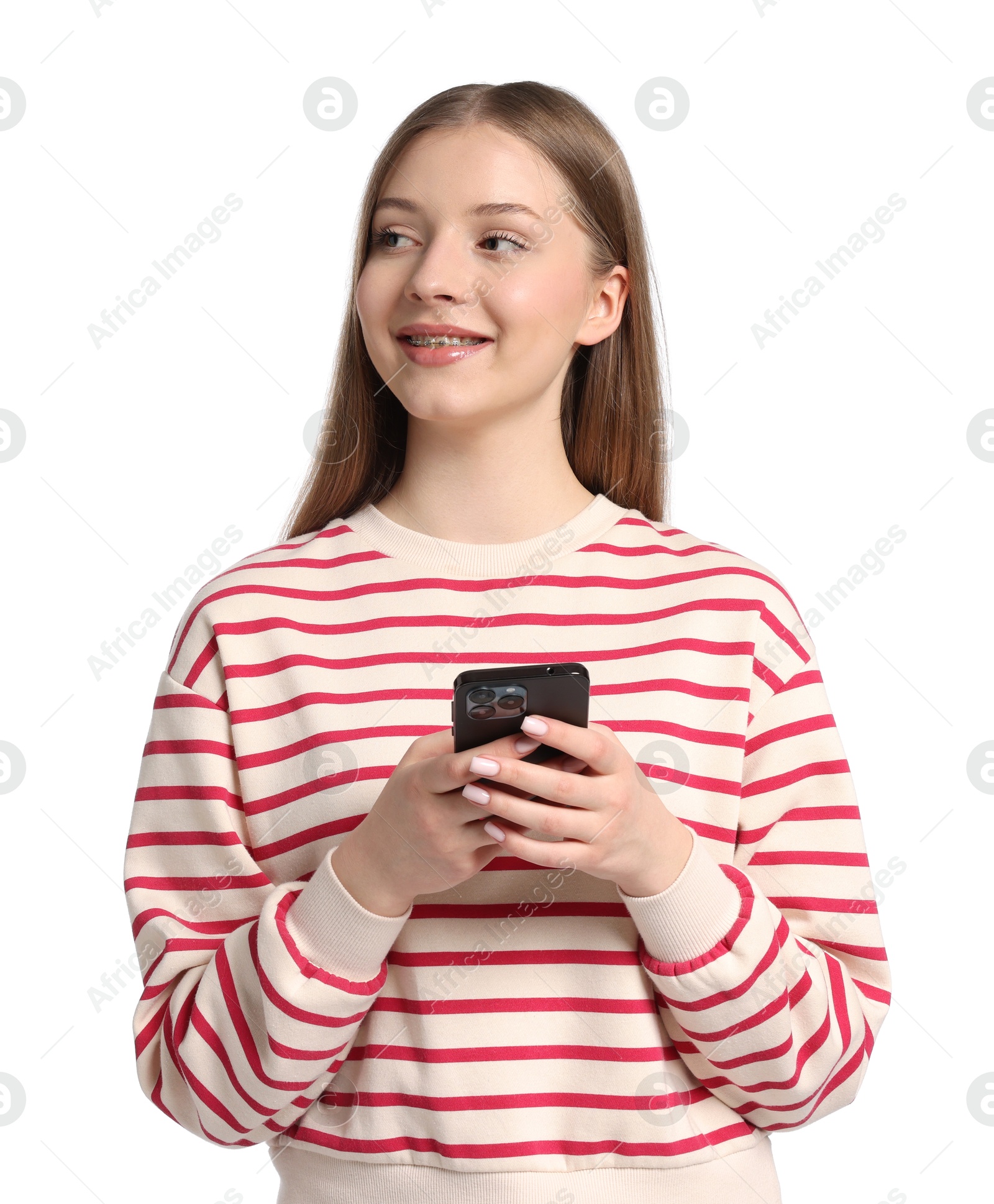 Teenage girl with smartphone on white background Photo of Teenage girl with smartphone on white background