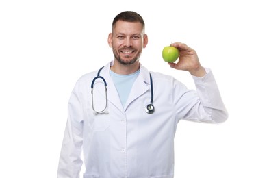Photo of Nutritionist with green apple and stethoscope on white background