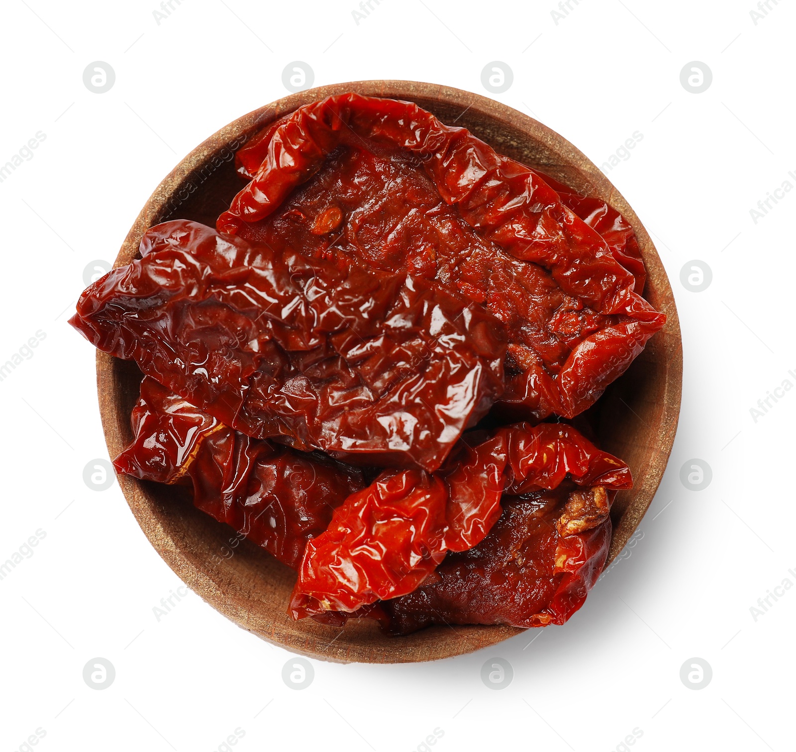 Delicious sun dried tomatoes in bowl isolated on white, top view Photo of Delicious sun dried tomatoes in bowl isolated on white, top view