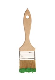 Photo of Brush with green paint isolated on white