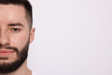 Photo of Man before shaving on light background, closeup. Space for text