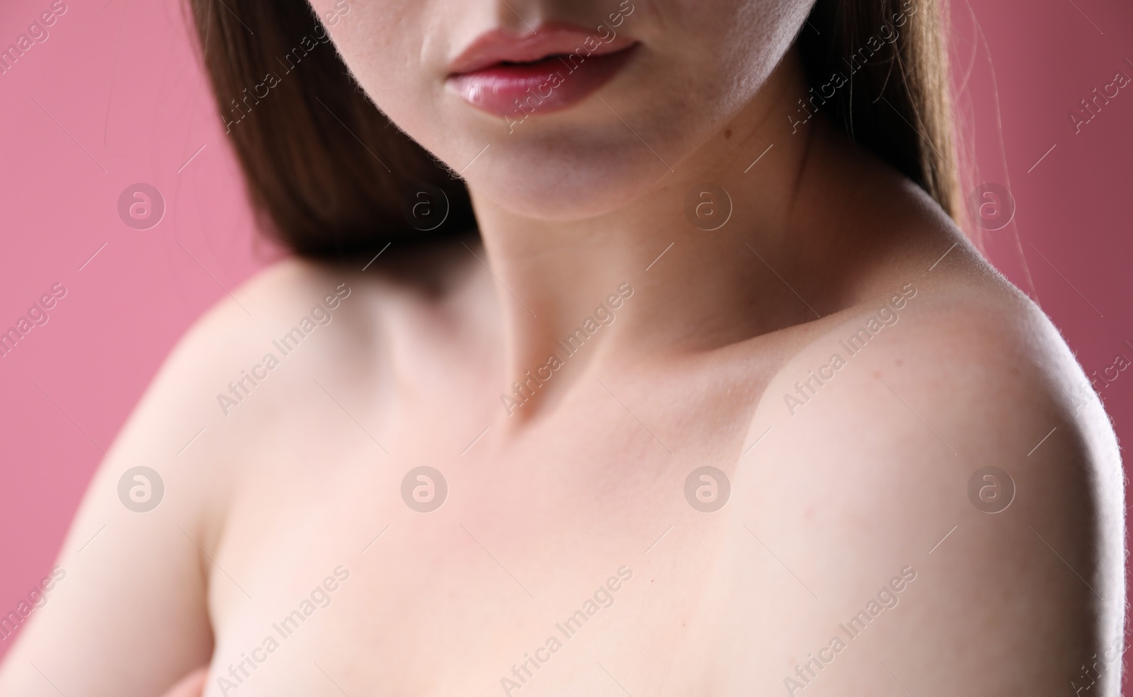 Woman with beautiful collarbones on pink background, closeup Photo of Woman with beautiful collarbones on pink background, closeup