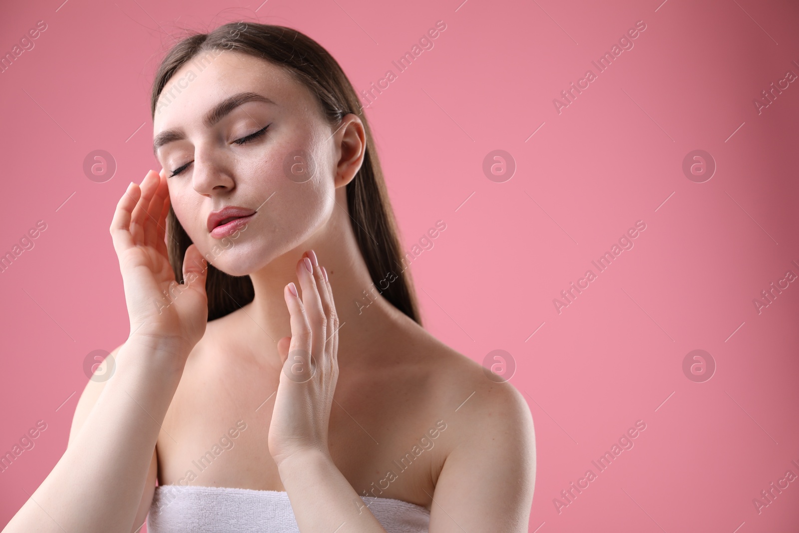 Portrait of beautiful woman on pink background. Space for text Photo of Portrait of beautiful woman on pink background. Space for text
