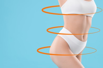 Image of Beautiful woman with perfect figure on light blue background, closeup. Circles around her body. Result of healthy lifestyle, diet, sport trainings