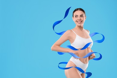 Image of Beautiful woman with perfect figure on light blue background, space for text. Ribbon around her body. Result of healthy lifestyle, diet, sport trainings