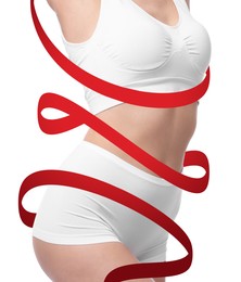 Image of Beautiful woman with perfect figure on white background, closeup. Ribbon around her body. Result of healthy lifestyle, diet, sport trainings