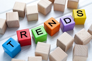 Image of Word Trends made of colorful cubes with letters on table