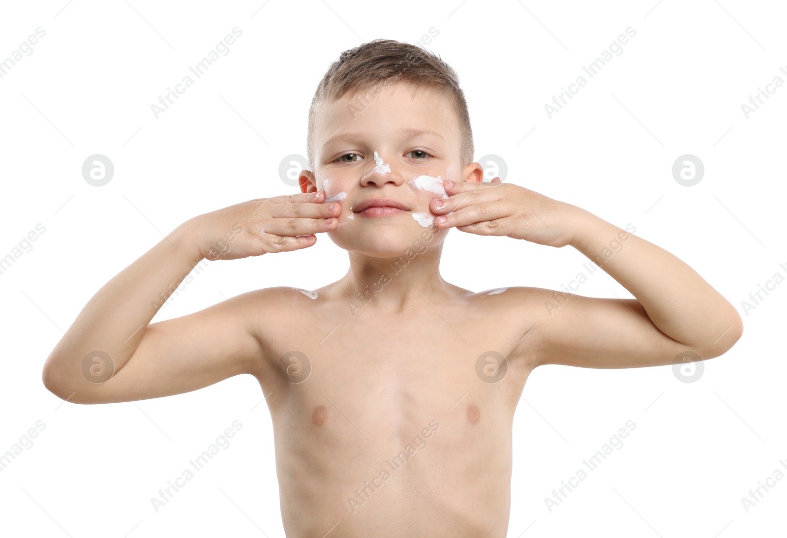 Little boy applying sun protection cream onto his skin on white background Photo of Little boy applying sun protection cream onto his skin on white background