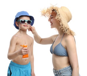 Photo of Mother applying sun protection cream onto her son's skin on white background