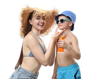Photo of Mother with sun protection cream and her son on white background