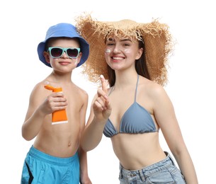 Photo of Mother with sun protection cream and her son on white background