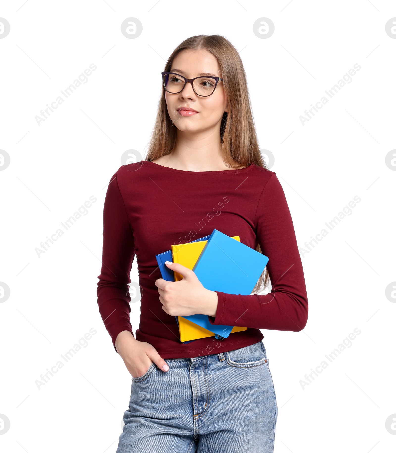 Teenage girl with books on white background Photo of Teenage girl with books on white background