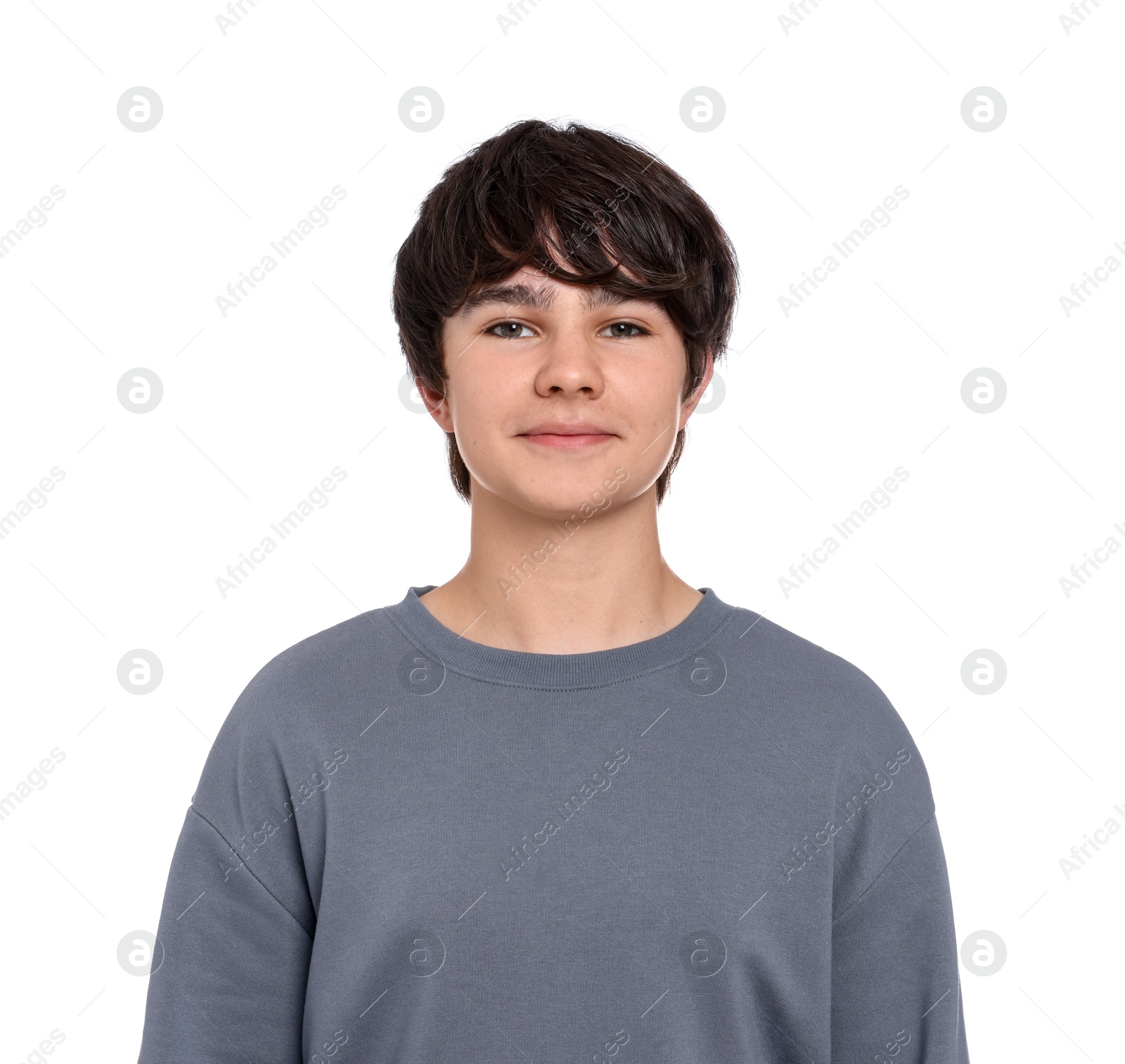 Portrait of teenage boy on white background Photo of Portrait of teenage boy on white background