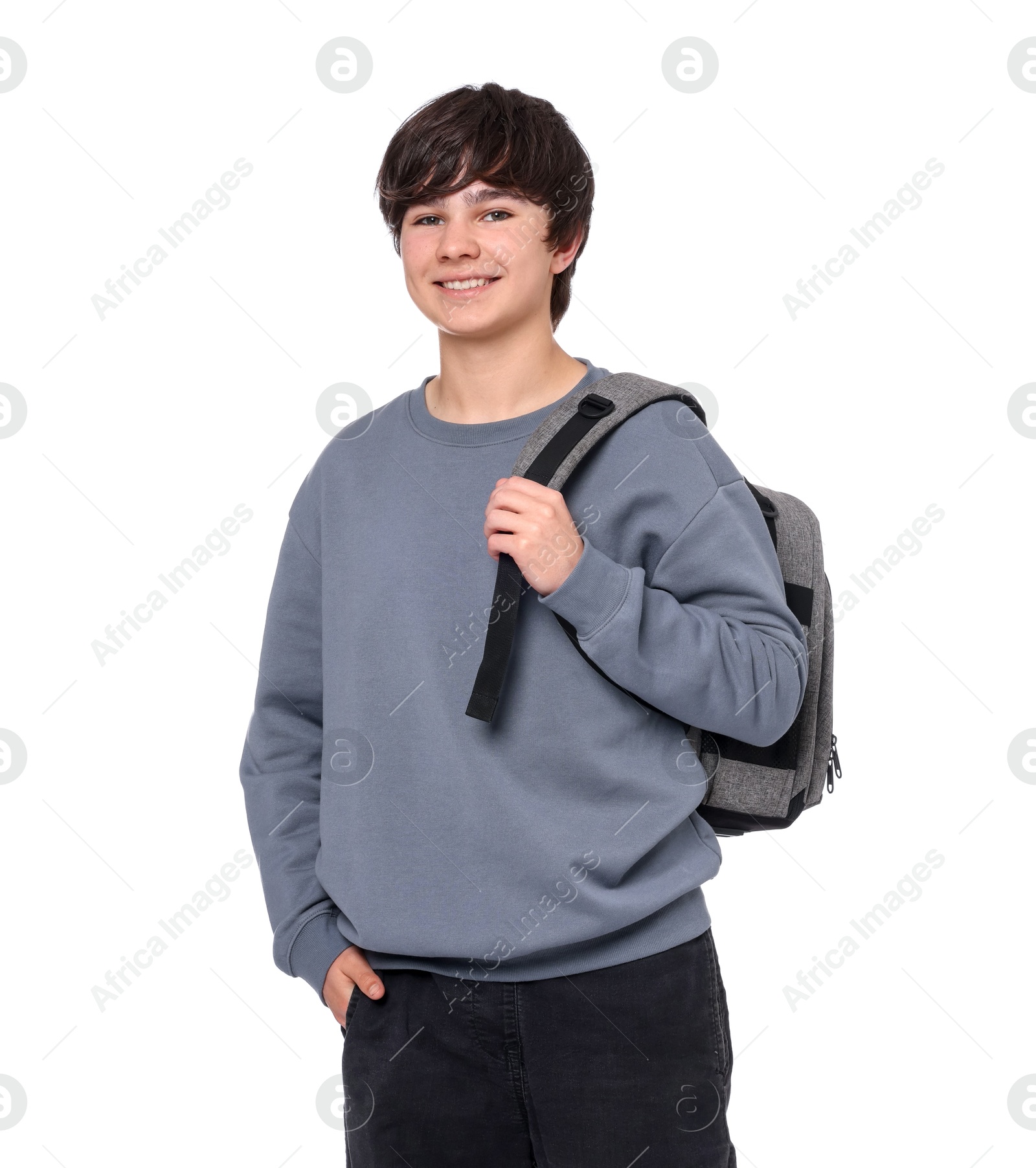 Portrait of teenage boy with backpack on white background Photo of Portrait of teenage boy with backpack on white background