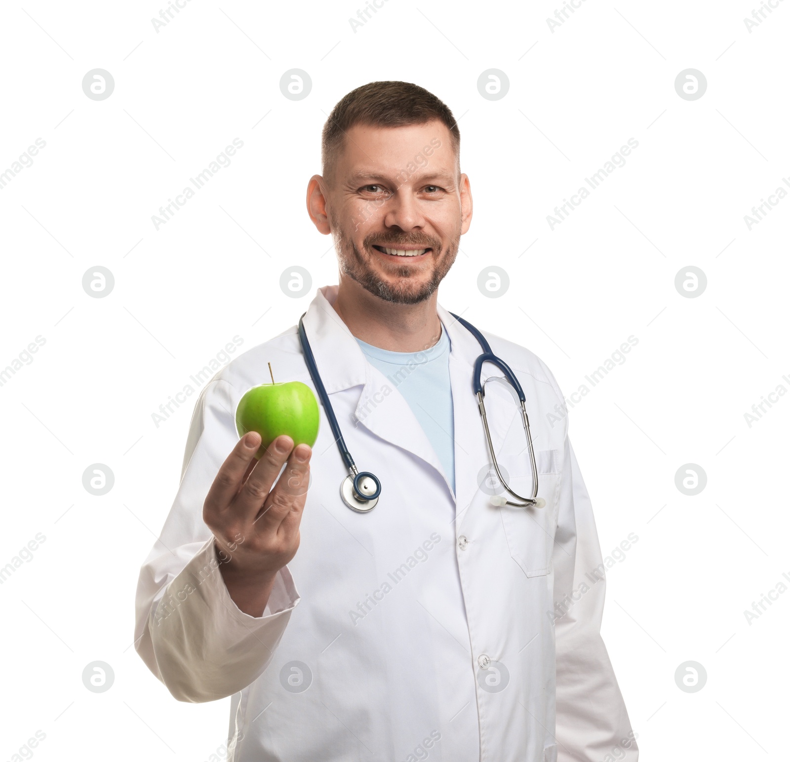 Nutritionist with green apple and stethoscope on white background Photo of Nutritionist with green apple and stethoscope on white background
