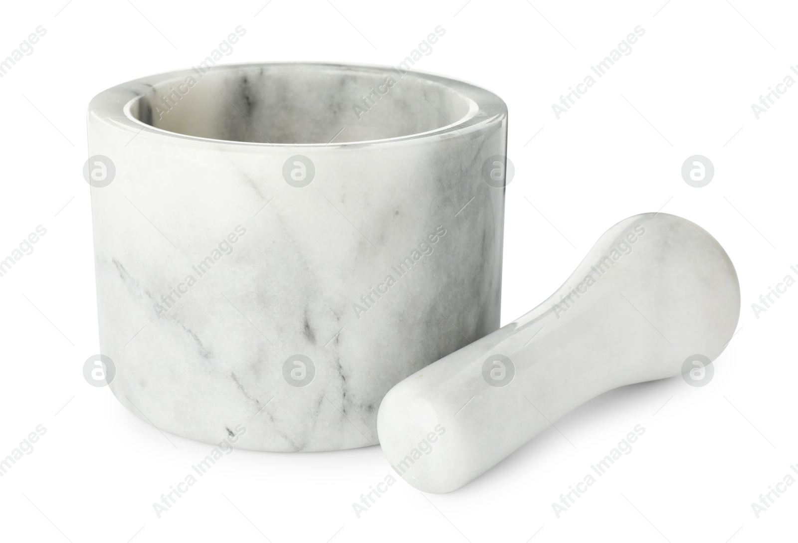 Marble mortar with pestle isolated on white Photo of Marble mortar with pestle isolated on white