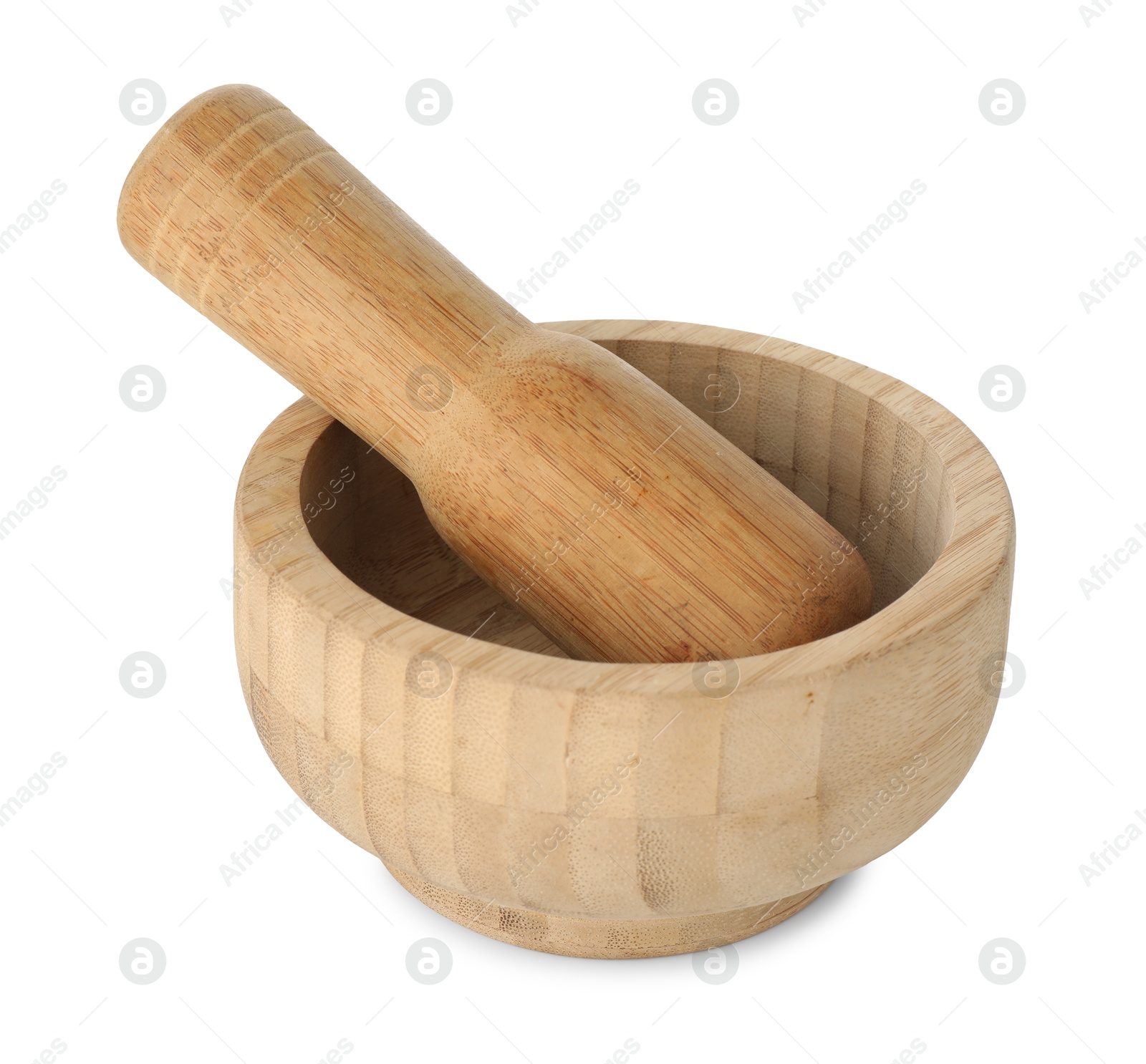 Wooden mortar with pestle isolated on white Photo of Wooden mortar with pestle isolated on white