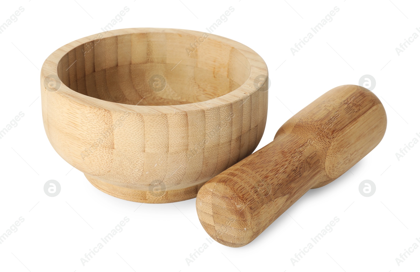 Wooden mortar with pestle isolated on white Photo of Wooden mortar with pestle isolated on white