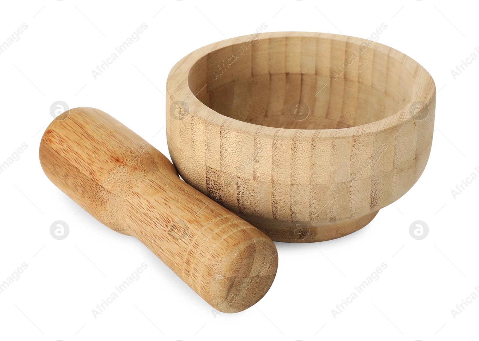 Wooden mortar with pestle isolated on white Photo of Wooden mortar with pestle isolated on white