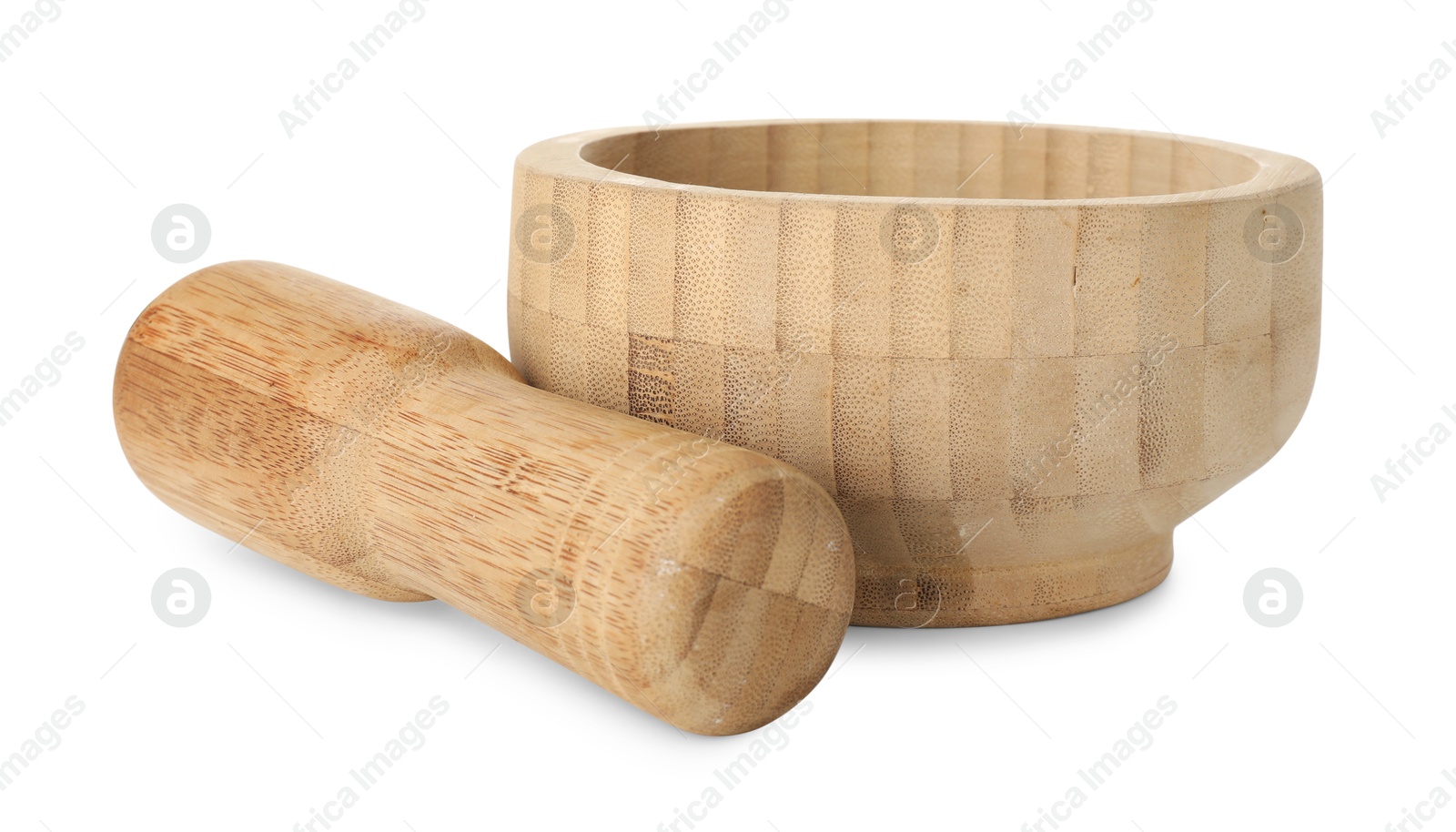 Wooden mortar with pestle isolated on white Photo of Wooden mortar with pestle isolated on white