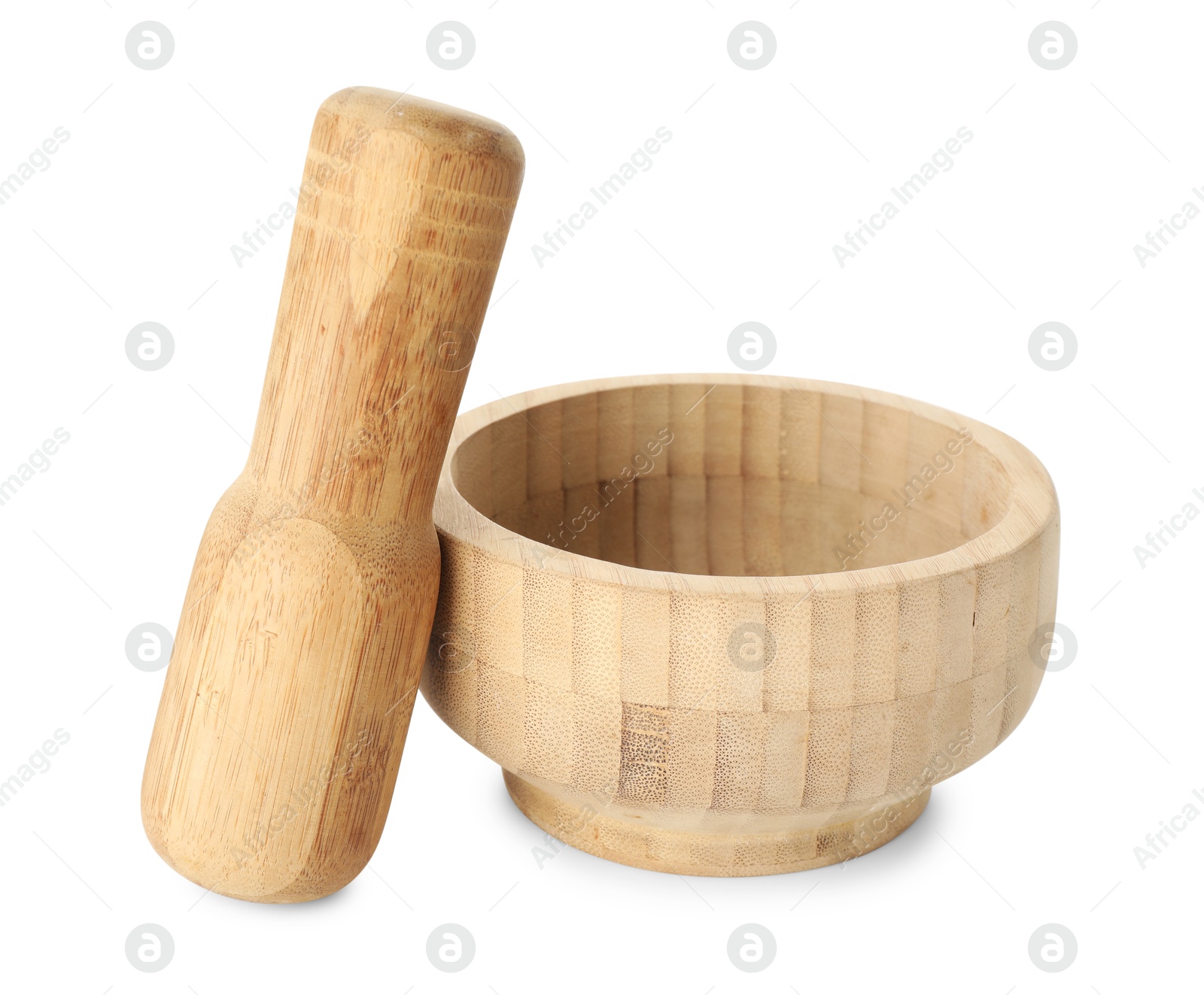 Wooden mortar with pestle isolated on white Photo of Wooden mortar with pestle isolated on white