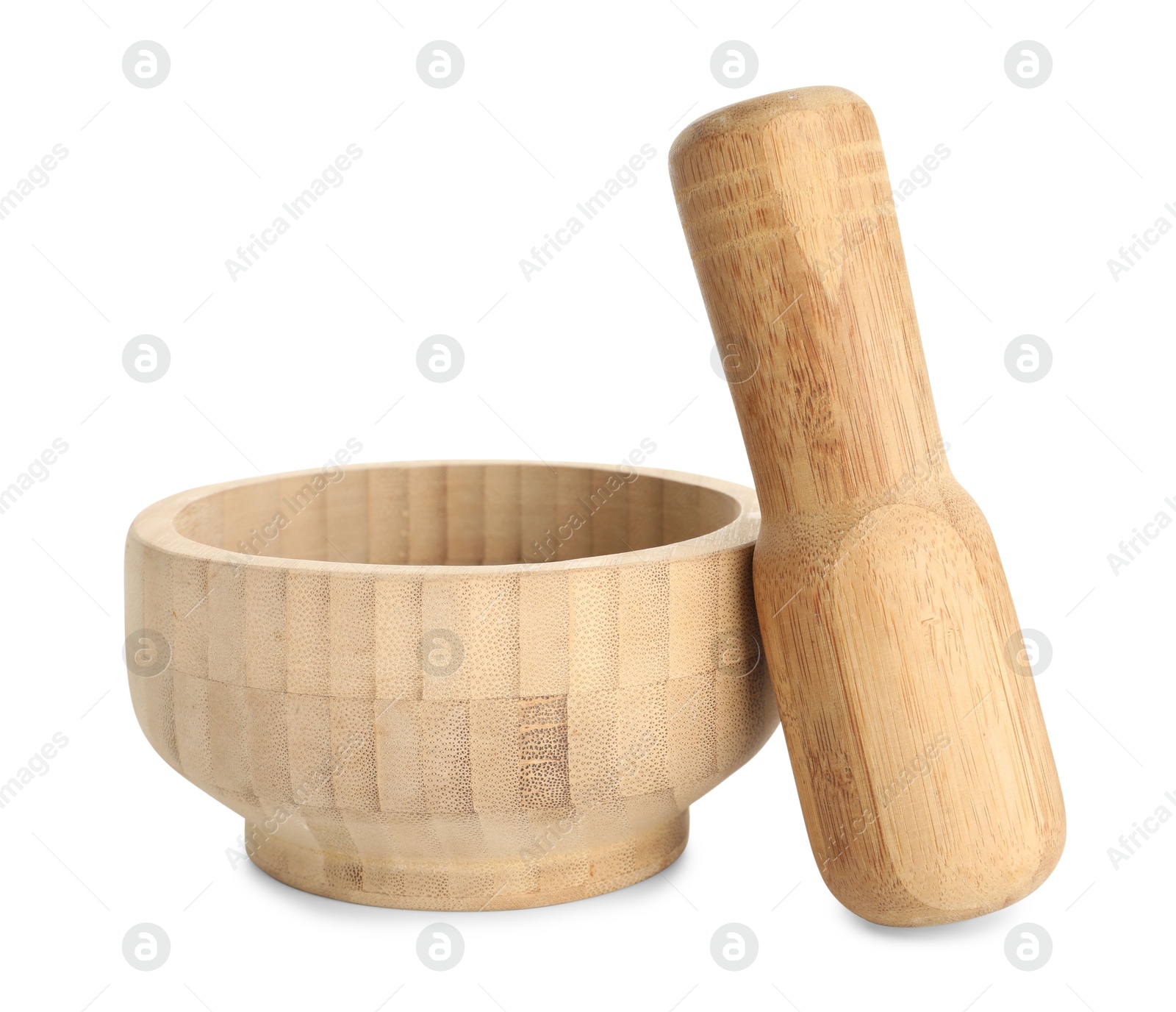 Wooden mortar with pestle isolated on white Photo of Wooden mortar with pestle isolated on white