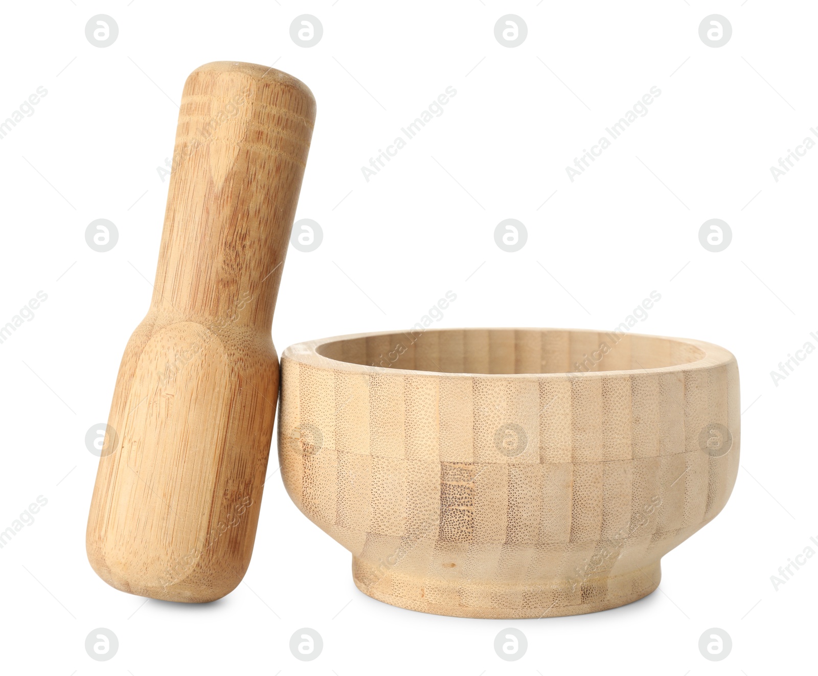 Wooden mortar with pestle isolated on white Photo of Wooden mortar with pestle isolated on white