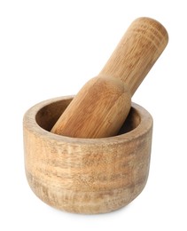 Photo of Wooden mortar with pestle isolated on white