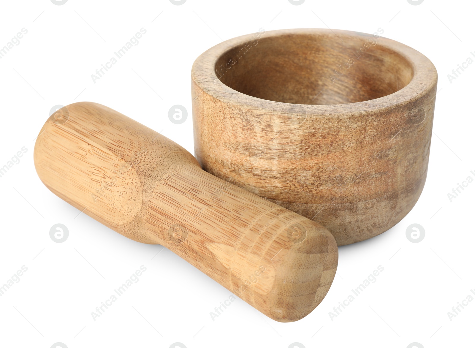 Wooden mortar with pestle isolated on white Photo of Wooden mortar with pestle isolated on white