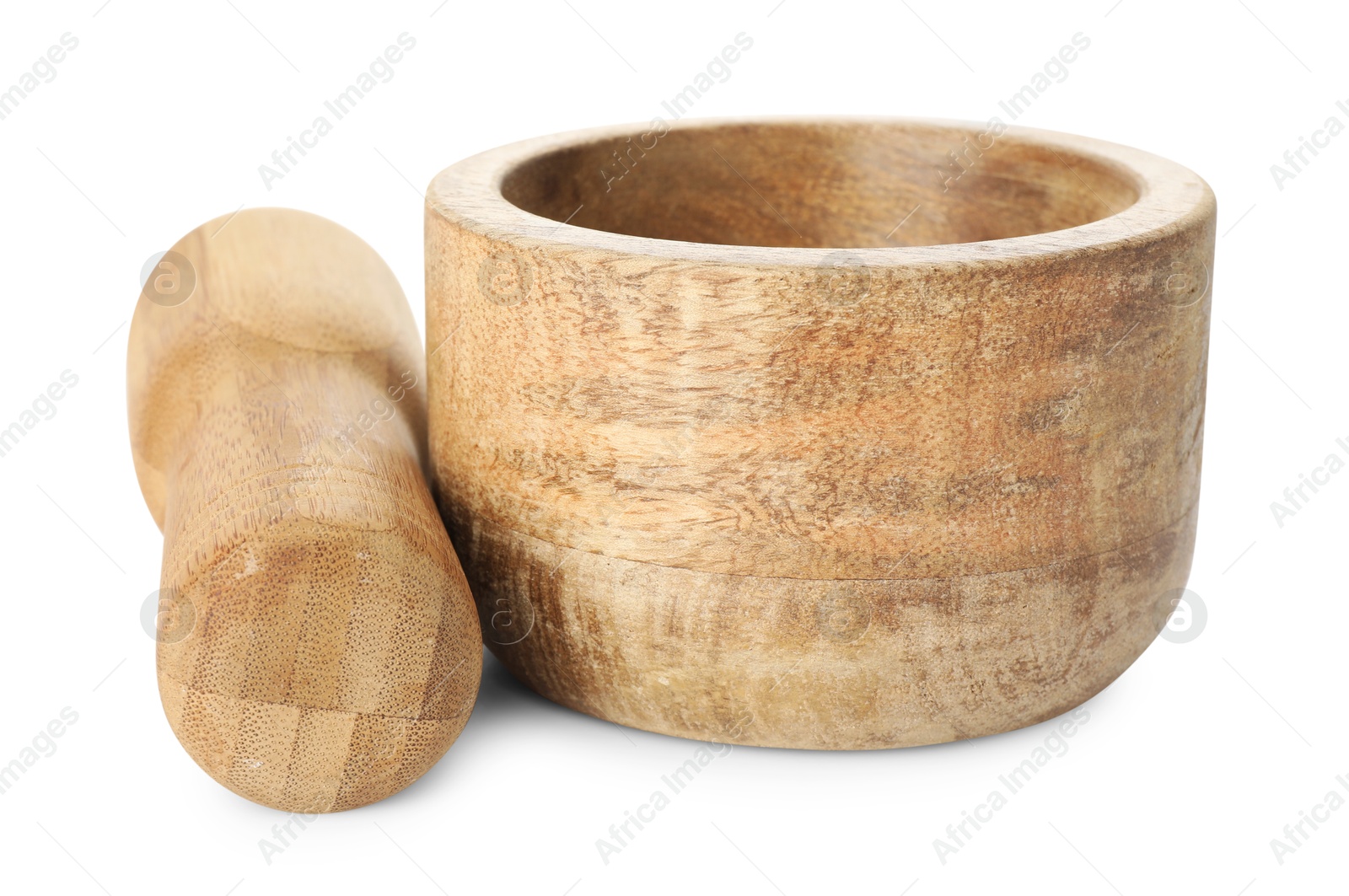 Wooden mortar with pestle isolated on white Photo of Wooden mortar with pestle isolated on white