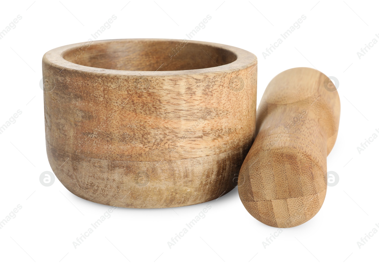 Wooden mortar with pestle isolated on white Photo of Wooden mortar with pestle isolated on white