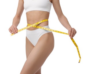 Photo of Woman with slim body and measuring tape on white background, closeup