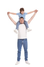 Photo of Father and his son having fun together on white background