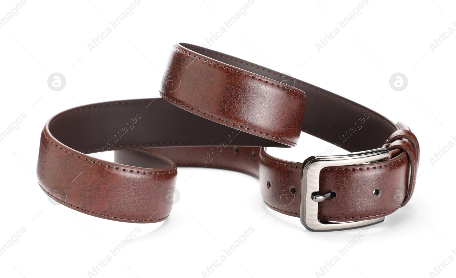 One brown leather belt isolated on white Photo of One brown leather belt isolated on white