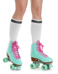 Photo of Woman in roller skates on white background, closeup