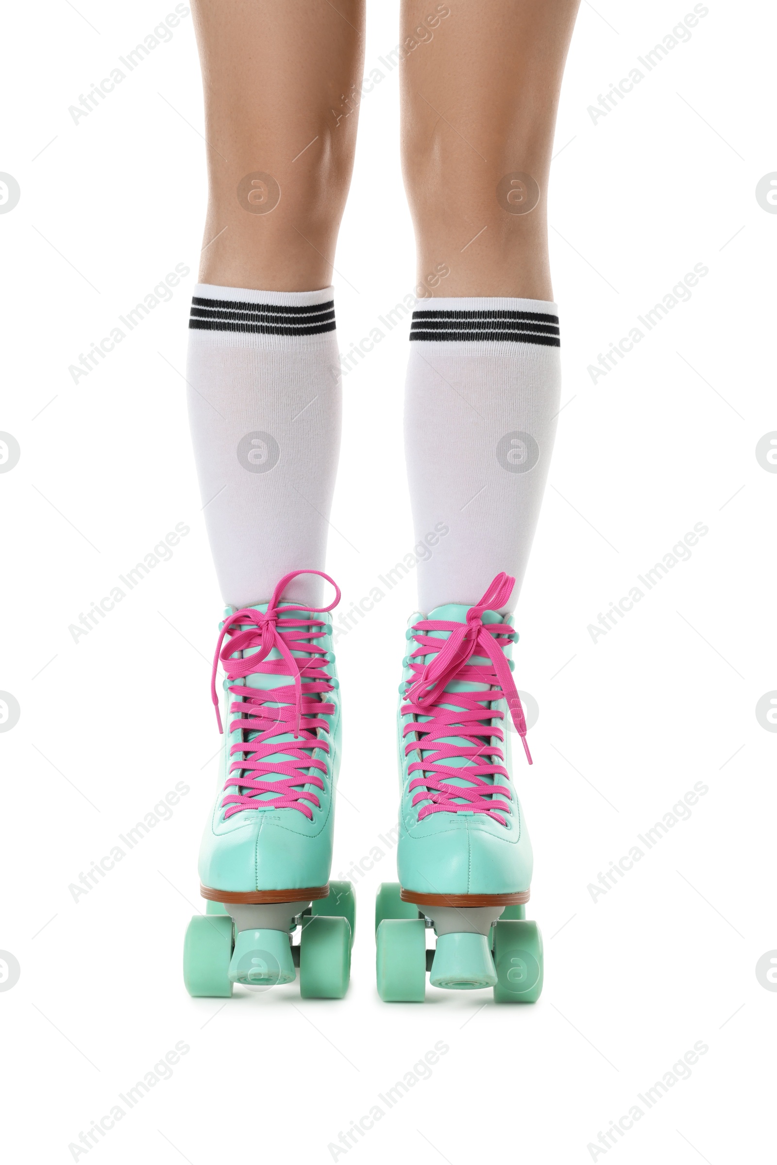 Woman in roller skates on white background, closeup Photo of Woman in roller skates on white background, closeup