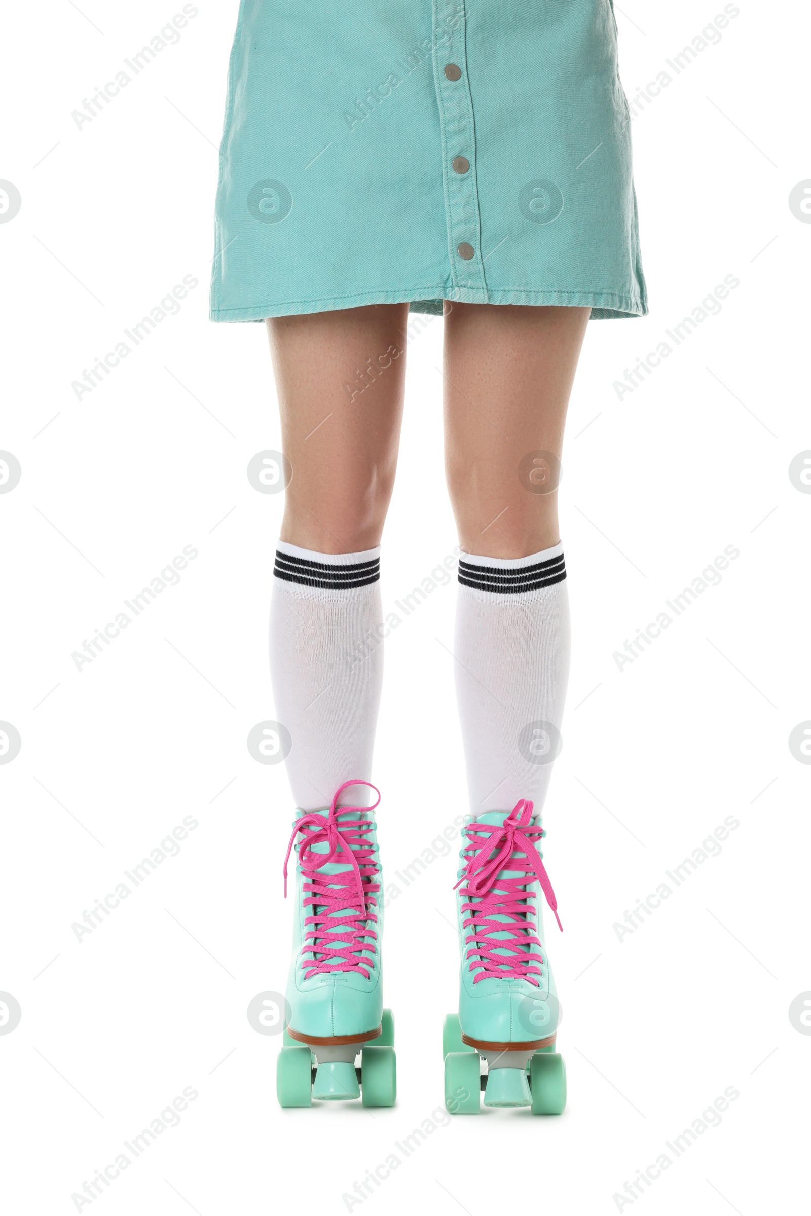 Woman in roller skates on white background, closeup Photo of Woman in roller skates on white background, closeup