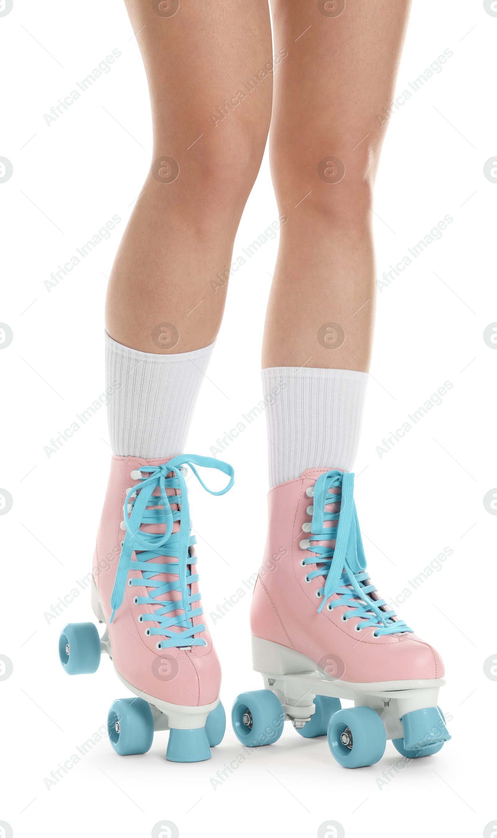 Woman in roller skates on white background, closeup Photo of Woman in roller skates on white background, closeup