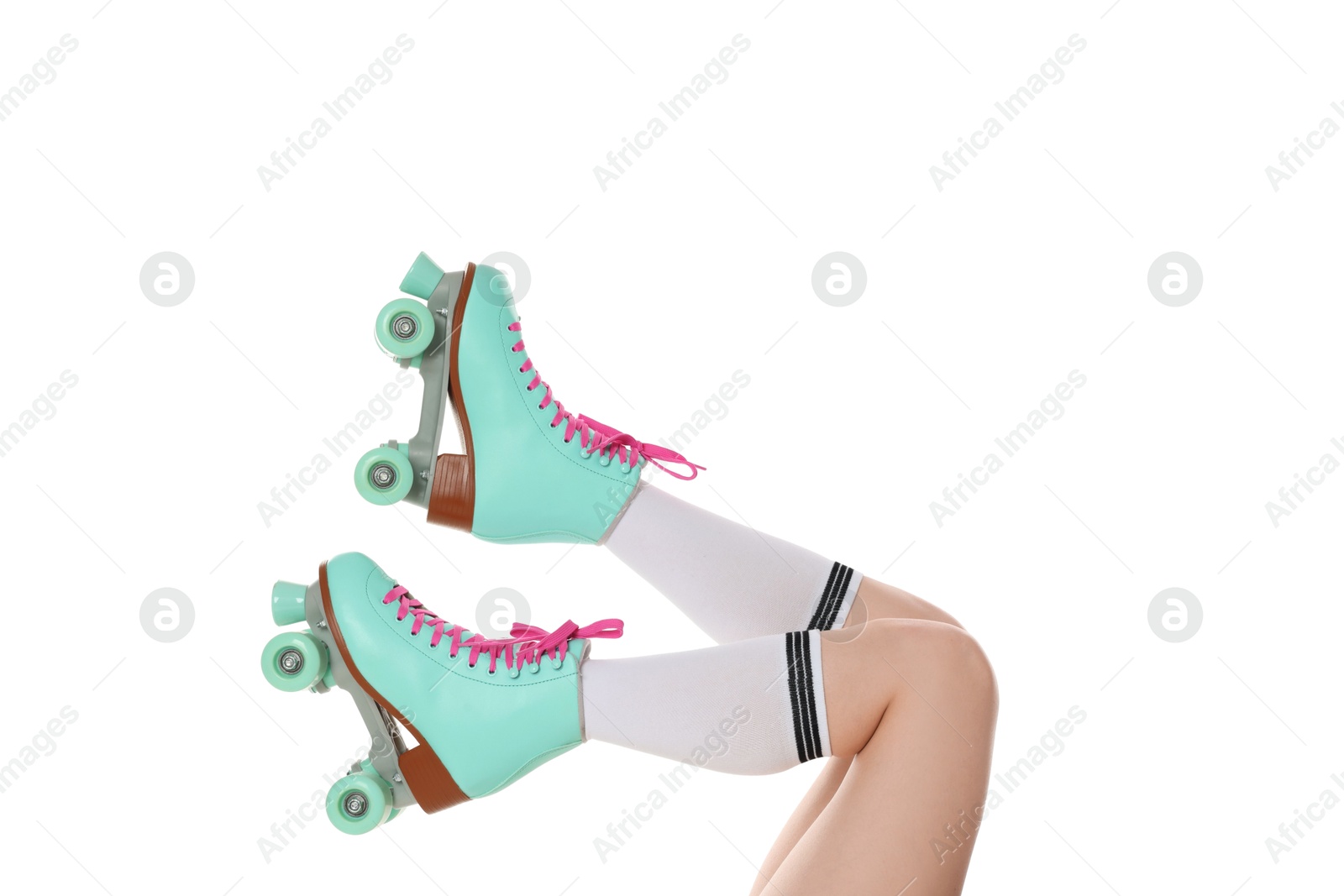 Woman in roller skates on white background, closeup Photo of Woman in roller skates on white background, closeup