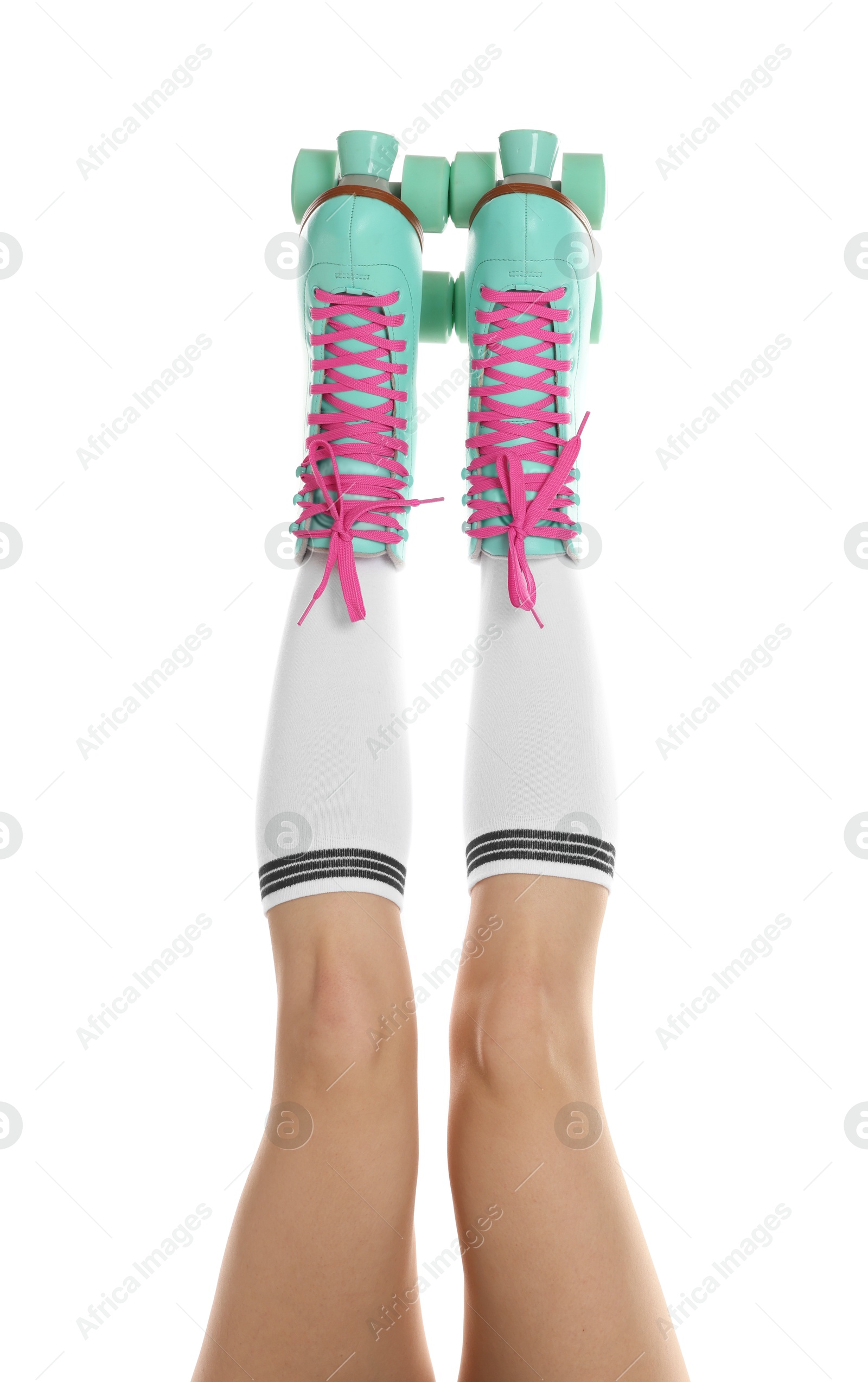 Woman in roller skates on white background, closeup Photo of Woman in roller skates on white background, closeup