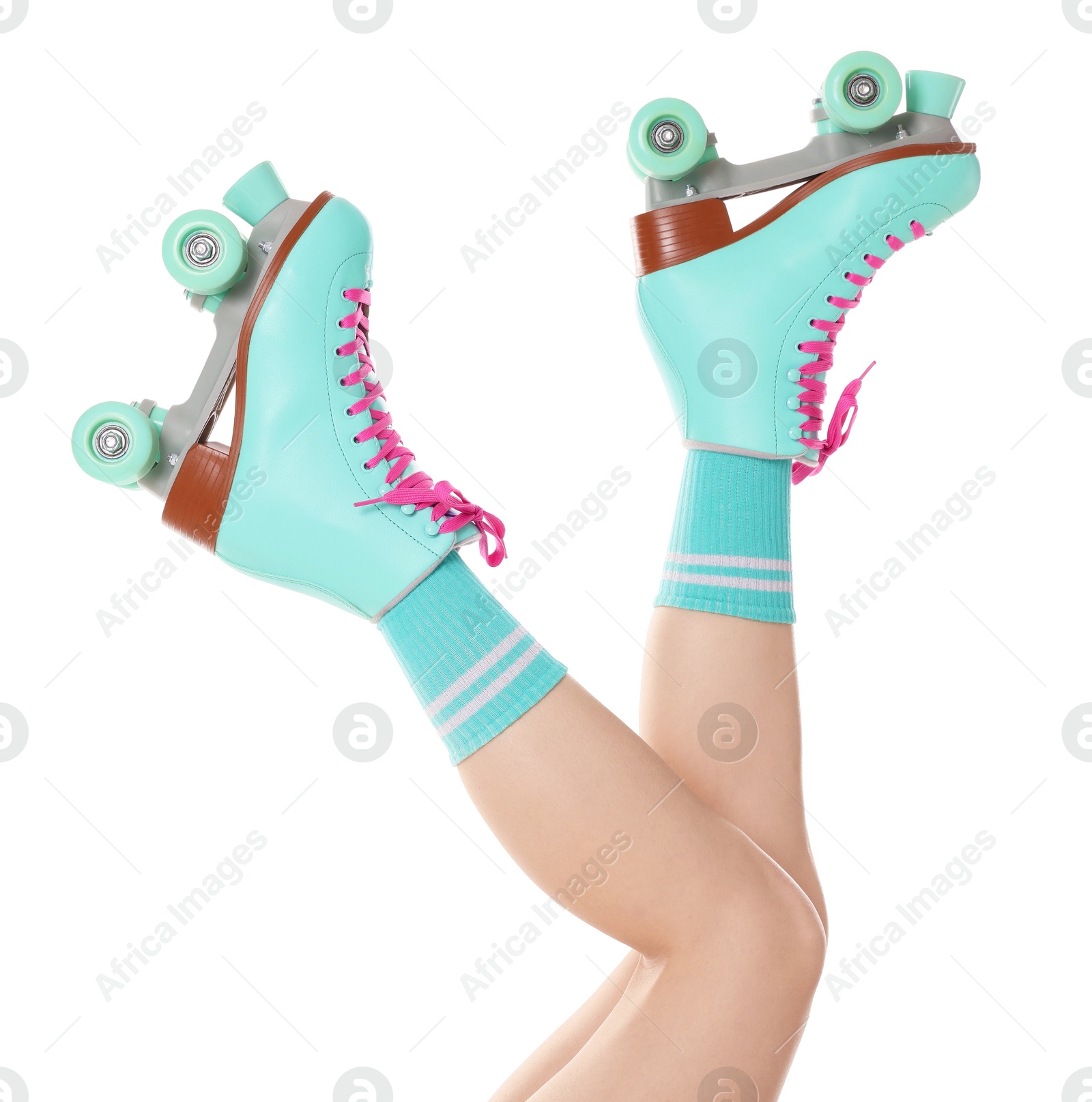 Woman in roller skates on white background, closeup Photo of Woman in roller skates on white background, closeup