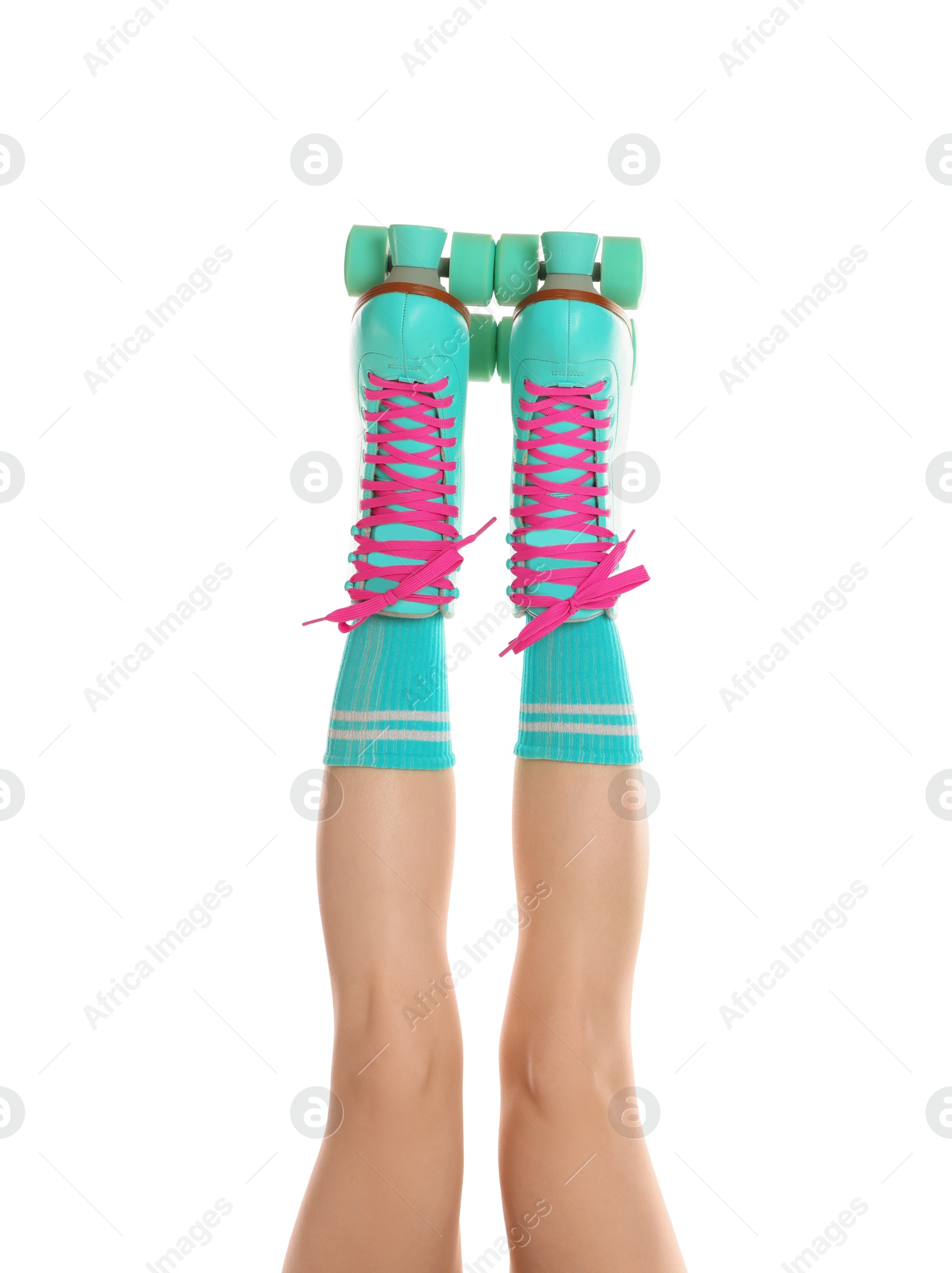 Woman in roller skates on white background, closeup Photo of Woman in roller skates on white background, closeup