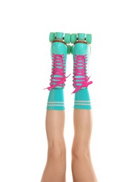 Photo of Woman in roller skates on white background, closeup