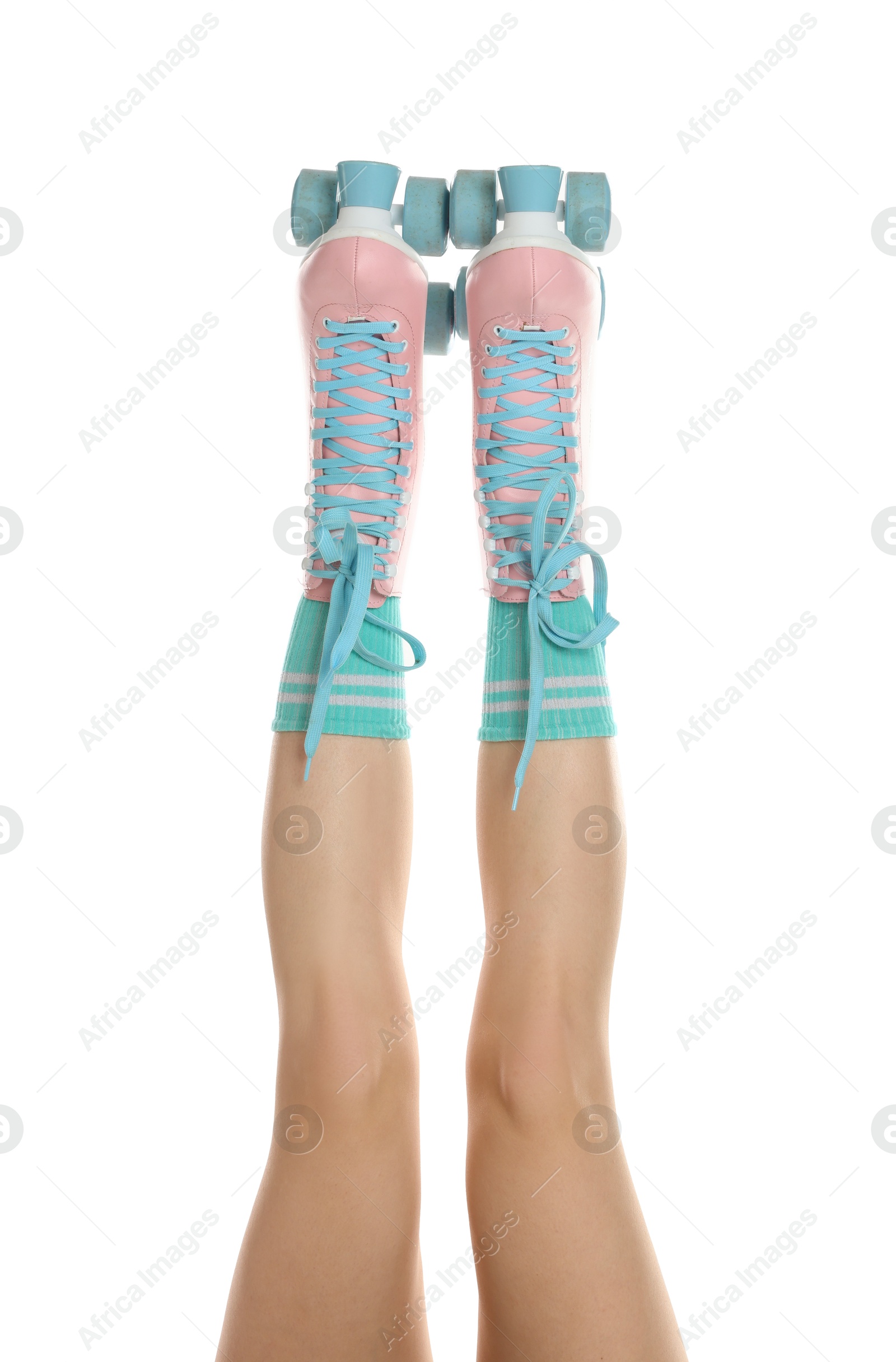 Woman in roller skates on white background, closeup Photo of Woman in roller skates on white background, closeup