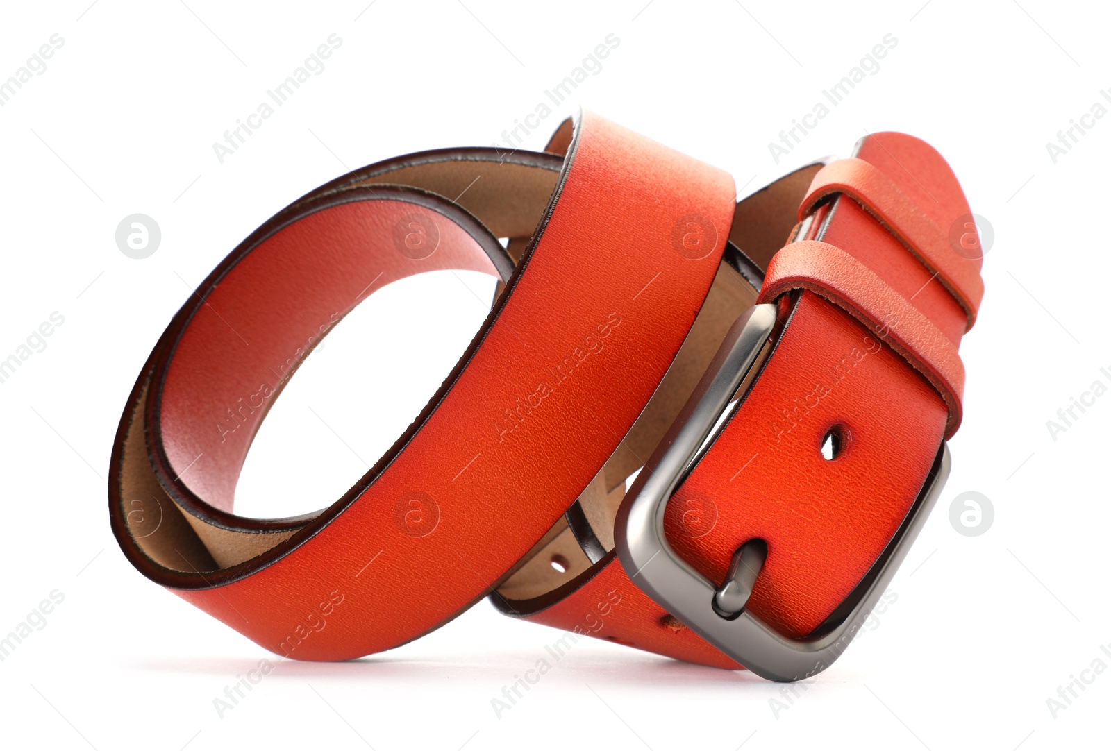 One orange leather belt isolated on white Photo of One orange leather belt isolated on white